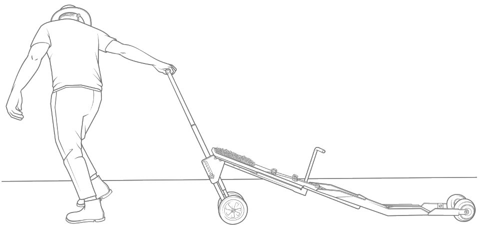 Pulling the Paperpot Transplanter down a bed